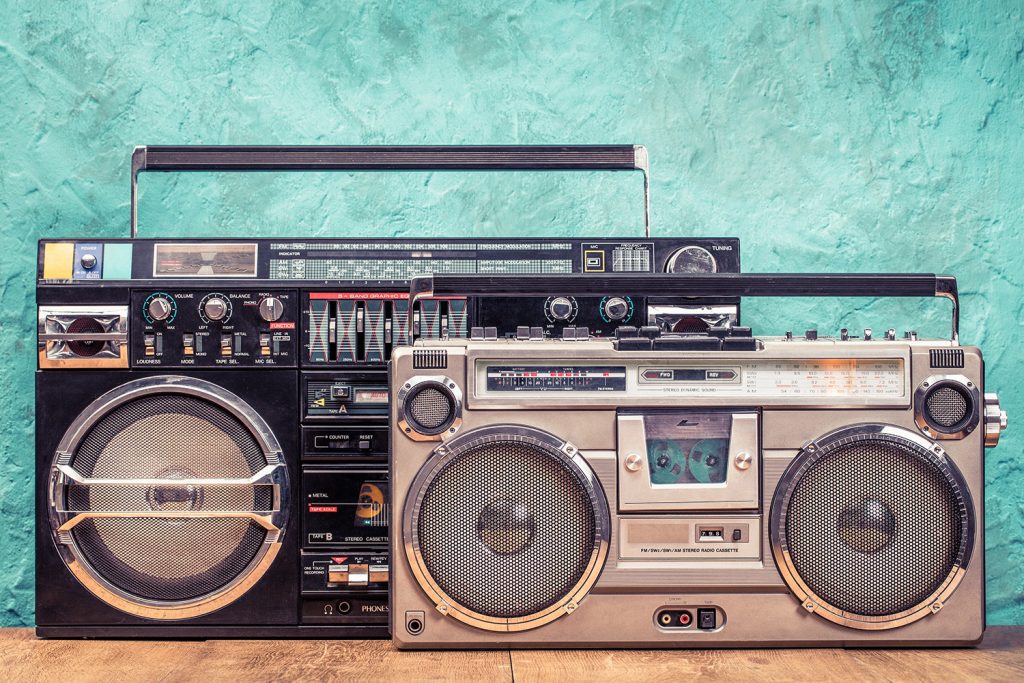Iconic boomboxes symbolizing Trill Productions' music, podcast, voiceover services